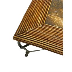 Mid-20th century coffee table, rectangular tiled wooden top framed by bamboo detailing, supported by wrought iron base with scrolled legs and central mosaic accent