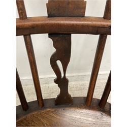 19th century yew wood and elm Windsor chair, low hoop stick back with pierced splat, dished seat raised on ring turned supports joined by crinoline stretcher