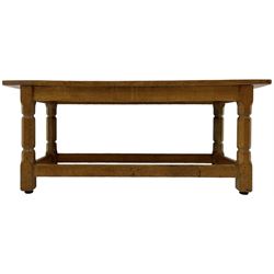 Yorkshire Oak - oak coffee table, rectangular top on octagonal supports, united by plain stretchers 