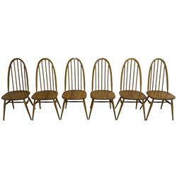 Ercol - light elm and beech set of ten (8+2) 'Quaker Windsor' dining chairs, high hoop and stick back over splayed supports united by H-stretcher, with foliate patterned crimson loose seat cushions