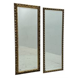 Two late 20th century giltwood rectangular mirrors, one with pierced scrolling foliate gil...