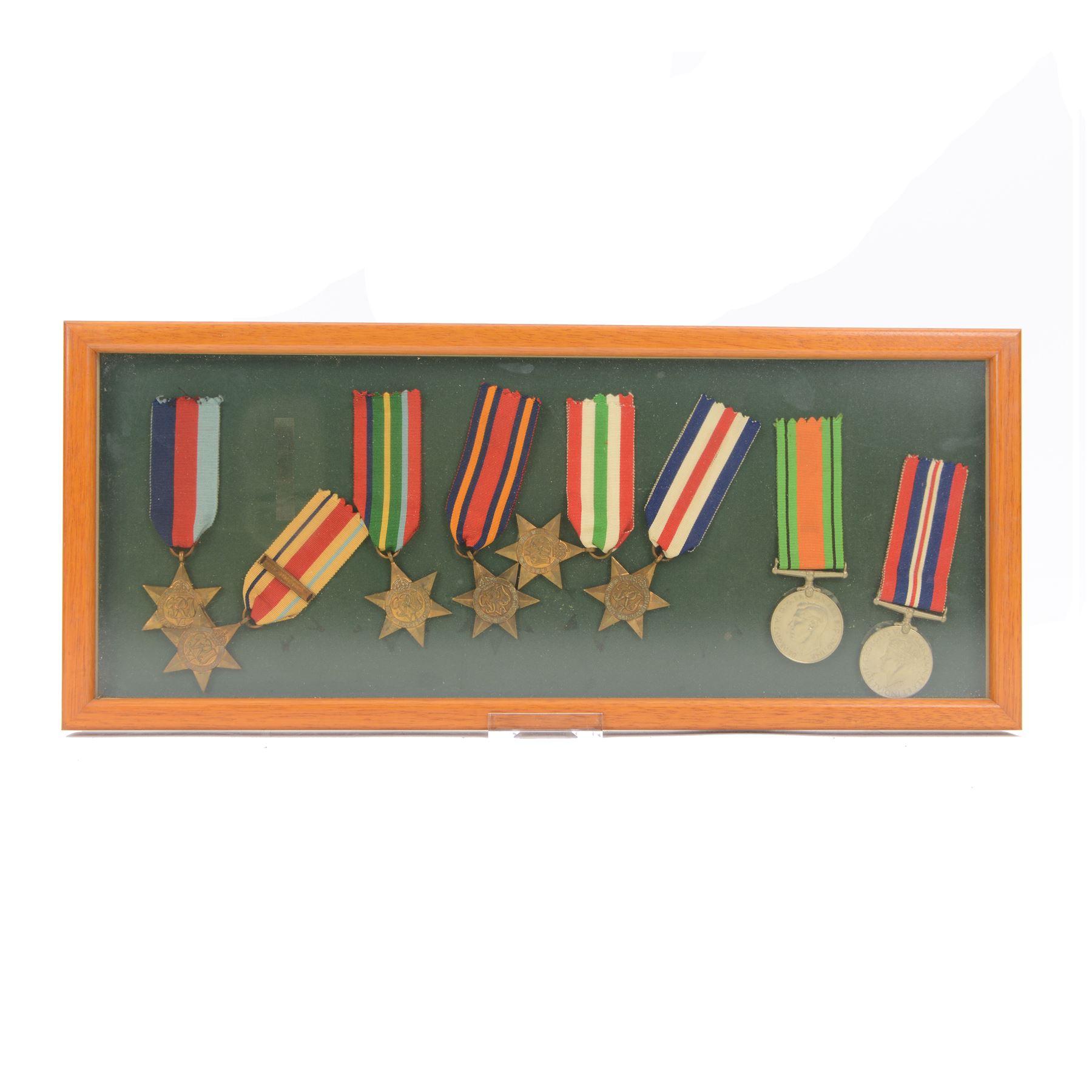 World War II medal group, comprising 1939-45 Star, Pacific Star, Burma Star, Italy Star, 
Atlantic Star, 1939-45 War medal and General Service medal, in glazed frame 