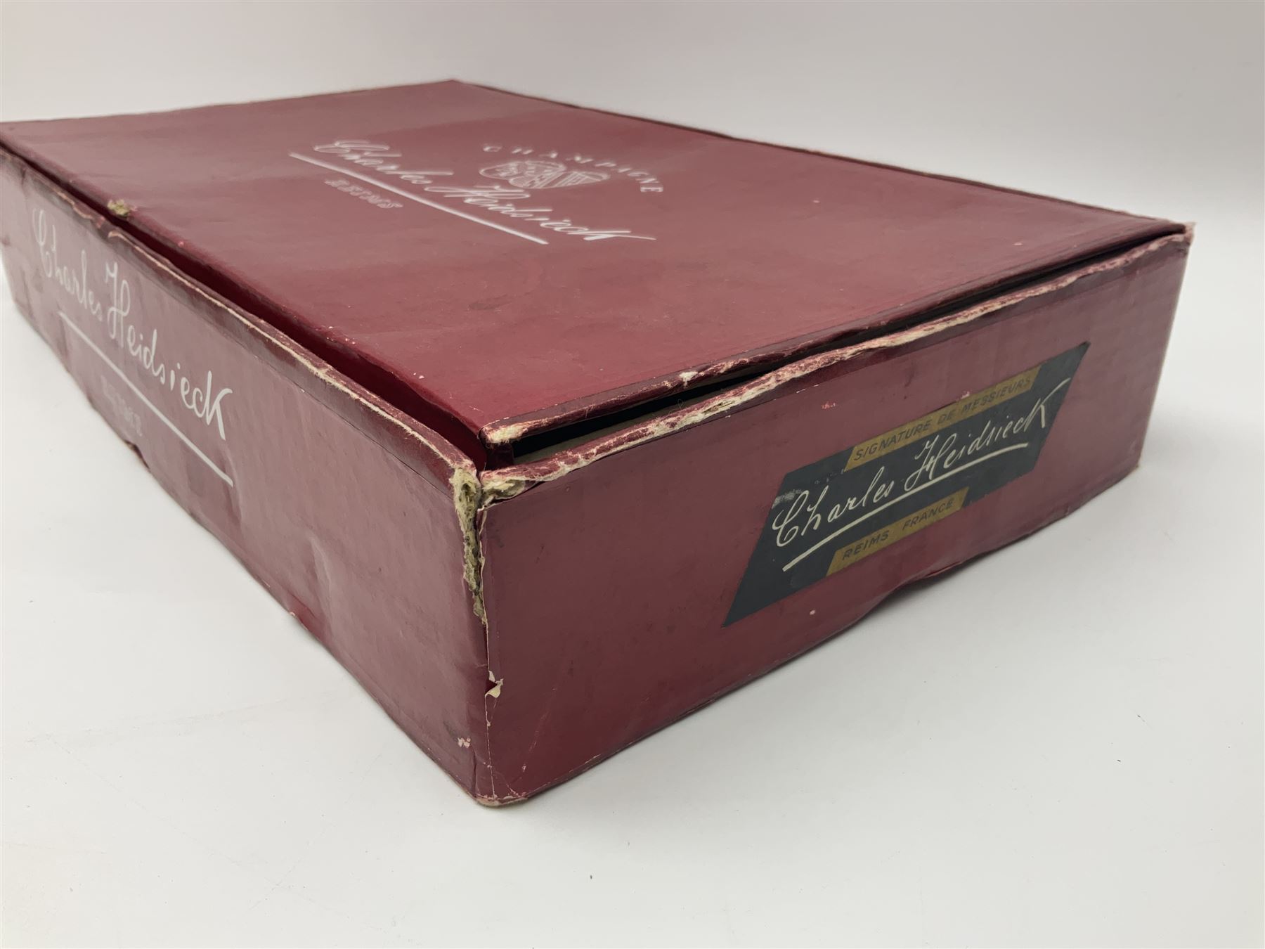 Charles Heidsieck champagne, set of six half bottles within red presentation box, unknown contents and proof 