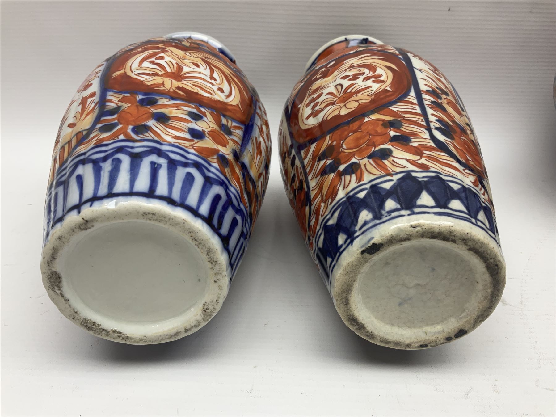 Pair of Japanese Imari vases with floral decoration, together with two Imari shell dishes etc, vases H24cm