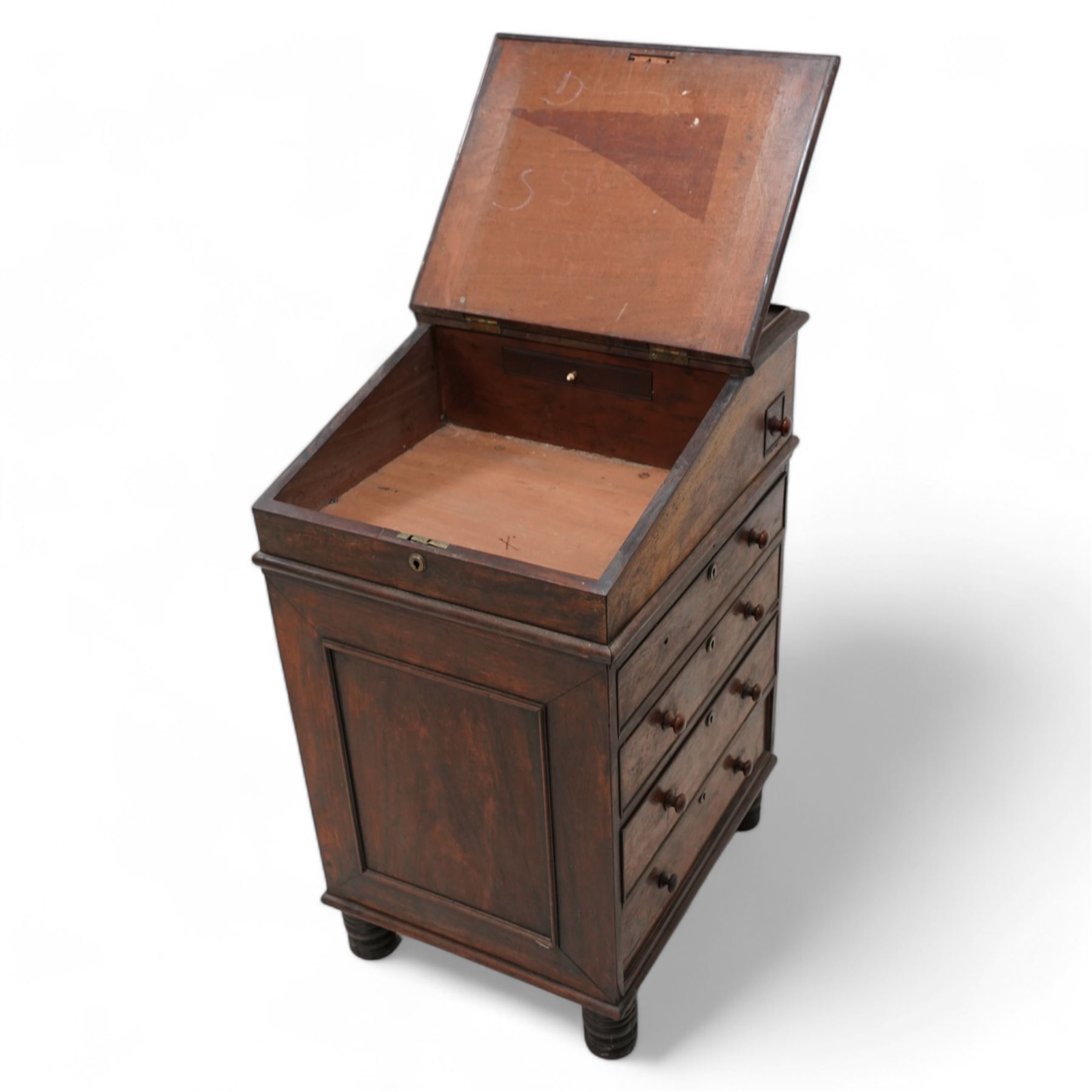 Early 19th century rosewood Davenport, sliding top section enclosed by moulded lid with leather inset, the interior fitted with single drawer, four graduating cock-beaded drawers to the right hand side and four false drawers to the opposing side, on turned feet 