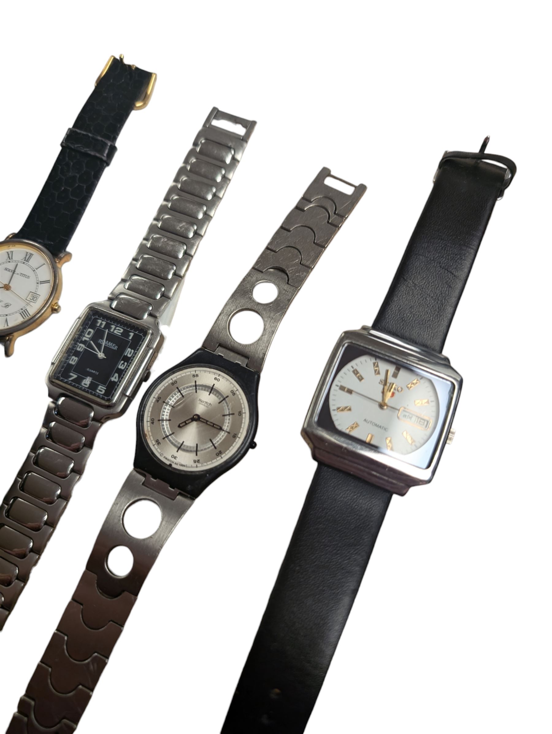 Seiko automatic wristwatch and a collection of quartz wristwatches including Tissot, Swatch, Armani ceramic, Roamer and Skagen