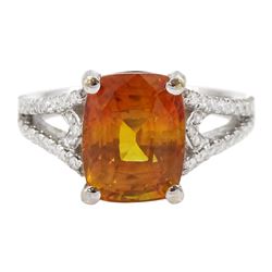 18ct white gold orange / yellow sapphire ring, with diamond set shoulders, hallmarked, sap...