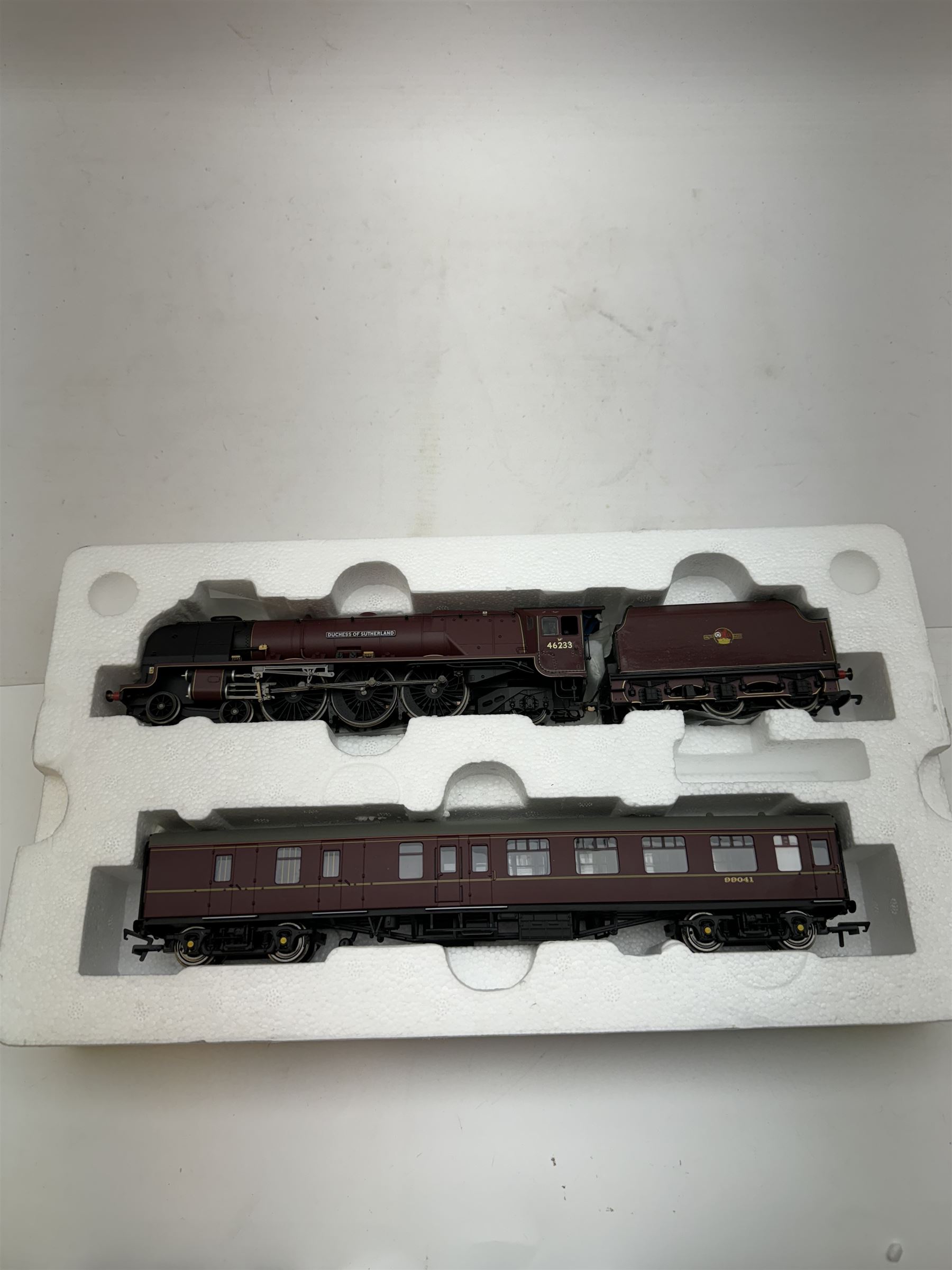 Hornby '00' gauge BR Duchess of Sutherland and Support Coach Train Pack R3221, comprising BR Princess Coronation Class 4-6-2 Duchess of Sutherland locomotive no. 46233 and BR MkI Brake Support Coach no. 99041, both in maroon livery, in original box