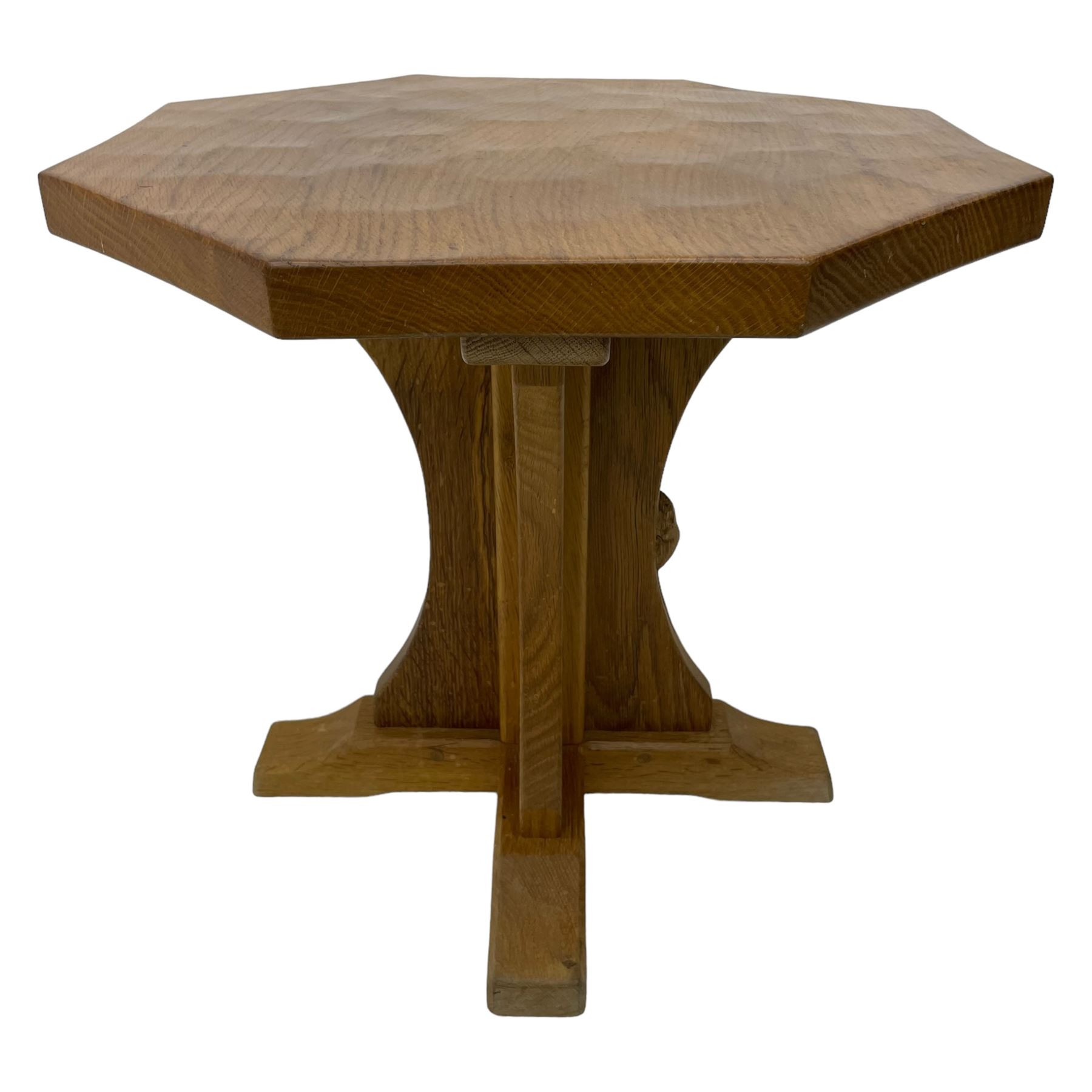 Mouseman - oak occasional table, octagonal adzed top, cruciform pedestal on sledge feet, carved with mouse signature, by the workshop of Robert Thompson, Kilburn 