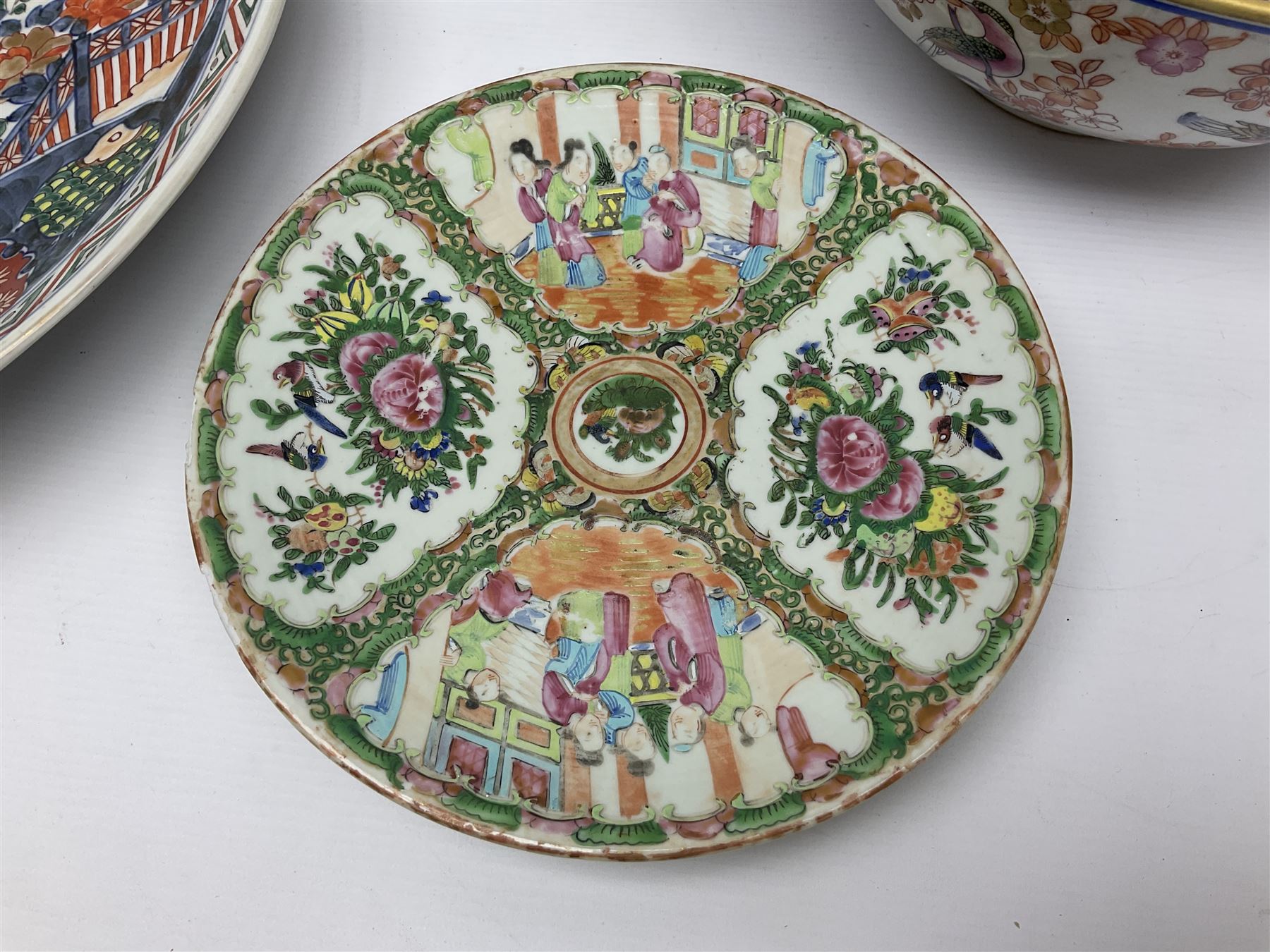 19th century and later Chinese ceramics, to include charger, with hand painted floral and foliate decoration, footed bowl, decorated in enamel with birds amongst prunus blossom,  a smaller plate decorated with figural panels and a ginger jar with cover, with hand painted floral decoration and four character marks beneath, charger D40.5cm