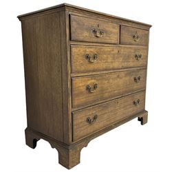 Early 20th century Georgian design oak chest, fitted with two short over three long drawers, lower moulded edge over bracket feet