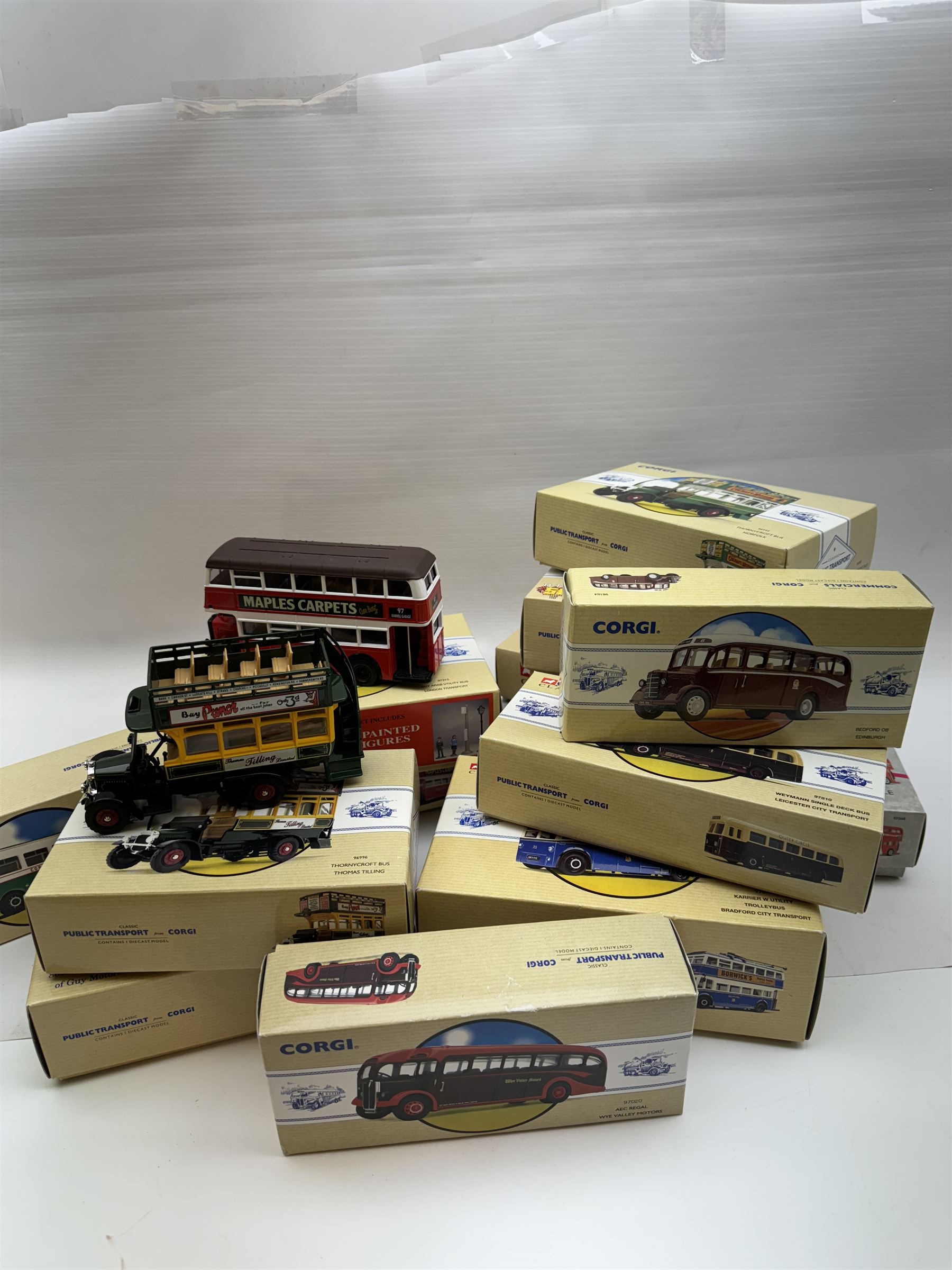 Fifteen limited edition Corgi Classic Public Transport vehicles, together with a 10th Anniversary Corgi Collector Club Scammell Scarab, Routemasters in Exile The North four bus collection and a Classic Commercials Bedford OB Edinburgh, all boxed with certificates (18)