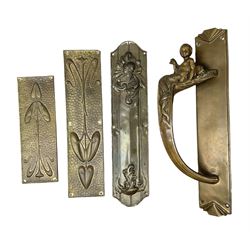 Art Nouveau bronze door handle modelled with a young merman holding a stylised fish, the plate decorated with geometric terminals, together with three repousse detail finger plates, largest L36cm