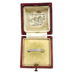 Early 20th century platinum channel set old cut diamond half eternity ring, stamped Plat, boxed