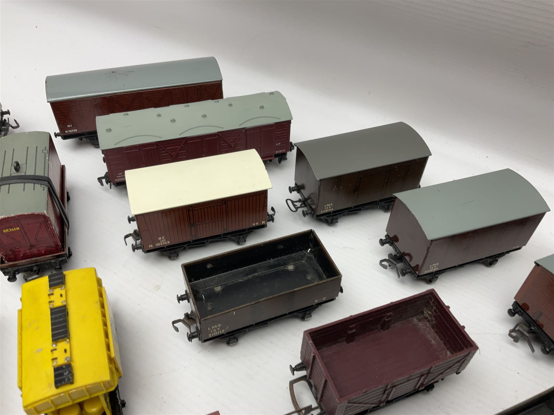 Hornby Dublo - forty-three goods wagons including nine tank wagons (Esso, Mobil, Vacuum, UD and Traffic Services), brake vans, meat and fish wagons, bogie well and bolsters, cable drums, open wagons, salt and grain wagons, etc; and six others by Tri-ang etc; all unboxed (49)