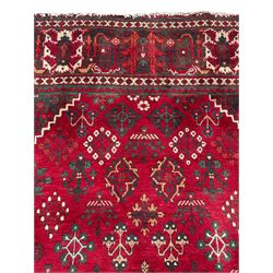 Persian Meymeh red ground rug, stepped lozenge medallion and spandrels, decorated all over with tree of life motifs, the main border decorated with repeating stylised plant motifs within geometric guard stripes 