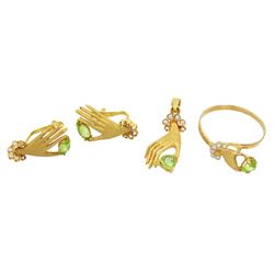 18ct gold green and clear stone set hand ring, pair of earrings and pendant, all stamped 750