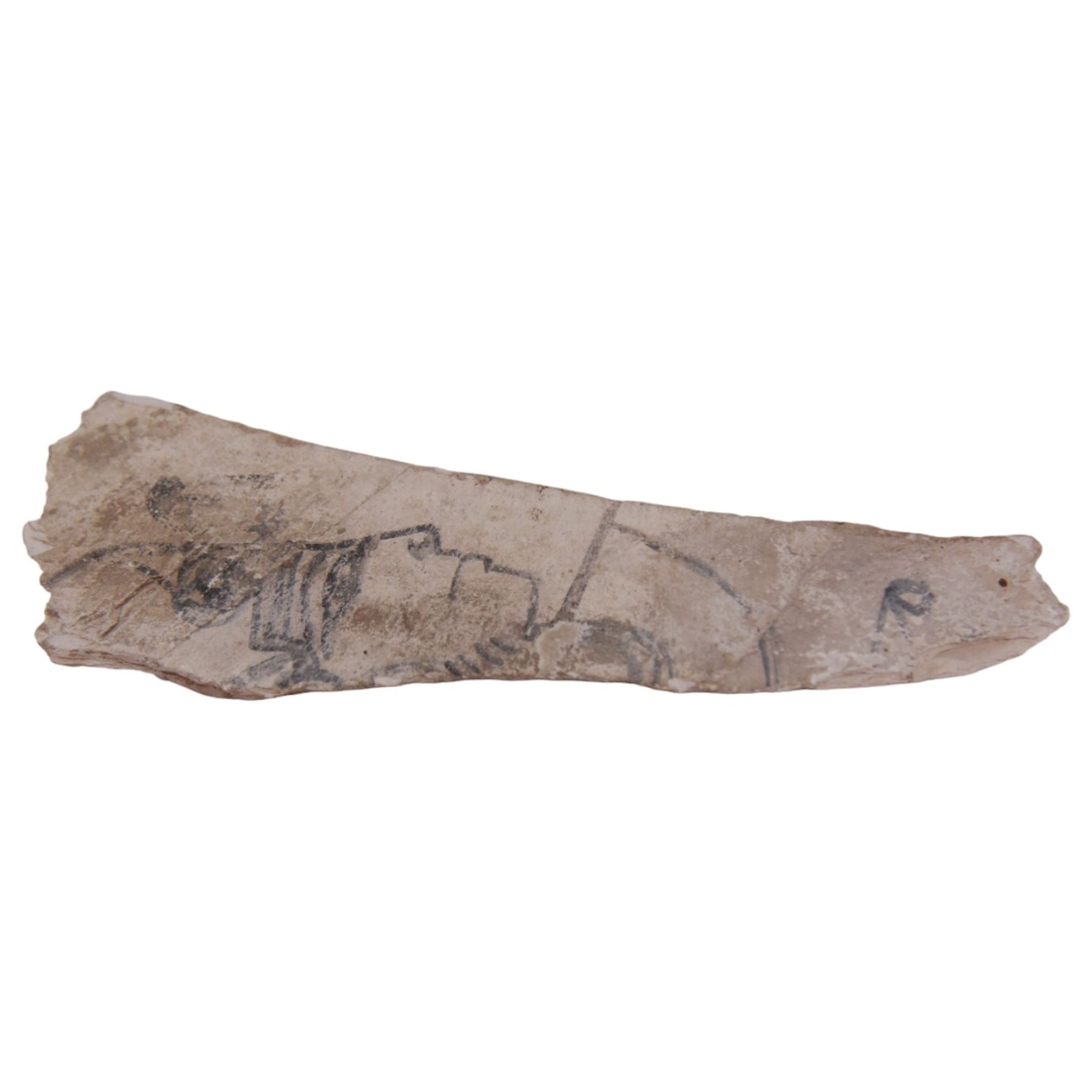 Egyptian stone fragment, probably New Kingdom limestone, depicting a figure in side profile, H14.5cm W6.5cm