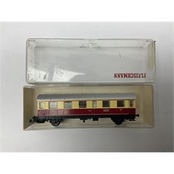 Fleischmann ‘N’ gauge ‘Piccolo’ - sixteen carriages, wagons and cars comprising nos. 8051, 8052, 8055, 8064, 8119K, 8127, 8128, 8129, 8202, 8211, 8224, 8240, 8281, 8301, 8500, 9372; along with Minitrix N503 Shock Van and 13576 6 ton Mineral Wagon; boxed and loose (18) 