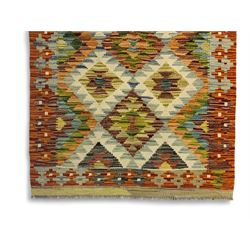 Chobi Kilim multi-coloured rug, the busy field decorated with all-over lozenges of contrasting colour, the guard lines decorated with further geometric designs