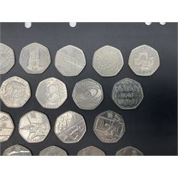 Forty Queen Elizabeth II commemorative fifty pence coins from circulation