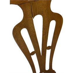 George III walnut elbow chair, shaped cresting rail over shaped pierced splat, the shaped arms with scroll carved terminals, upholstered drop in seat, on square chamfered supports united by plain stretchers 