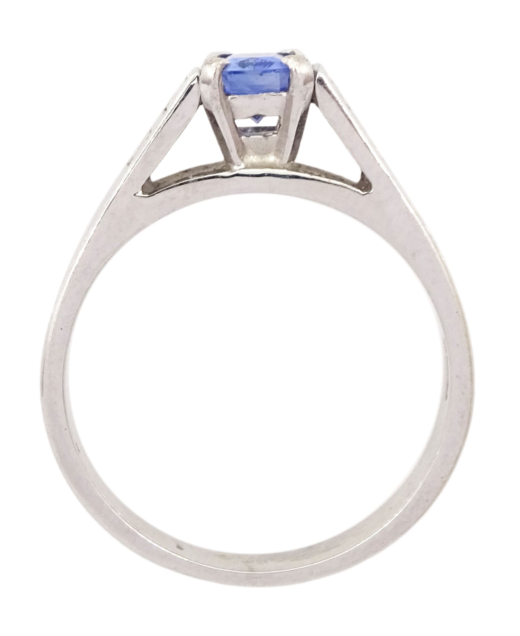 White gold single stone radiant cut sapphire ring, with baguette diamond shoulders, hallmarked 9ct, sapphire approx 0.65 carat