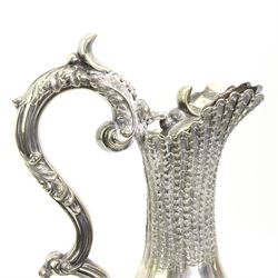 Victorian silver plated claret jug, the body of baluster form, with scroll handle, textured neck and the base cast with stiff leaves, on a beaded circular pedestal foot, H34.5cm 