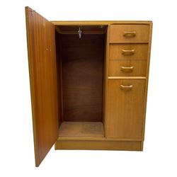 G-Plan - mid 20th century teak tallboy or combination wardrobe, left side with full-height hanging cupboard, right side with three drawers, the top fitted with vanity mirror, above cupboard with shelves, raised on a plinth base