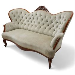 Victorian walnut double-ended settee, shaped cresting rail with foliate carved pediment, u...