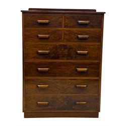 Early 20th century walnut chest, fitted with four short and four long drawers, on recessed plinth base