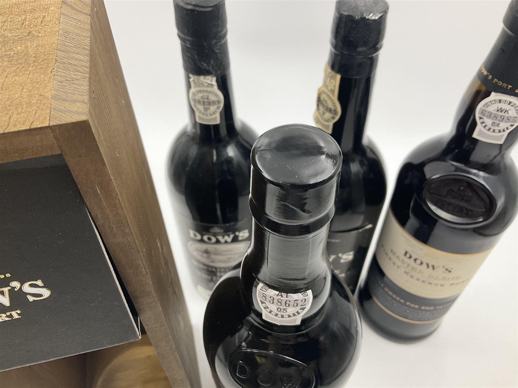 Four bottles Dow's port, comprising, 1975, 1979, Master Blend, and 2001 Quinta Do Bomfim, various contents and proof (4) 