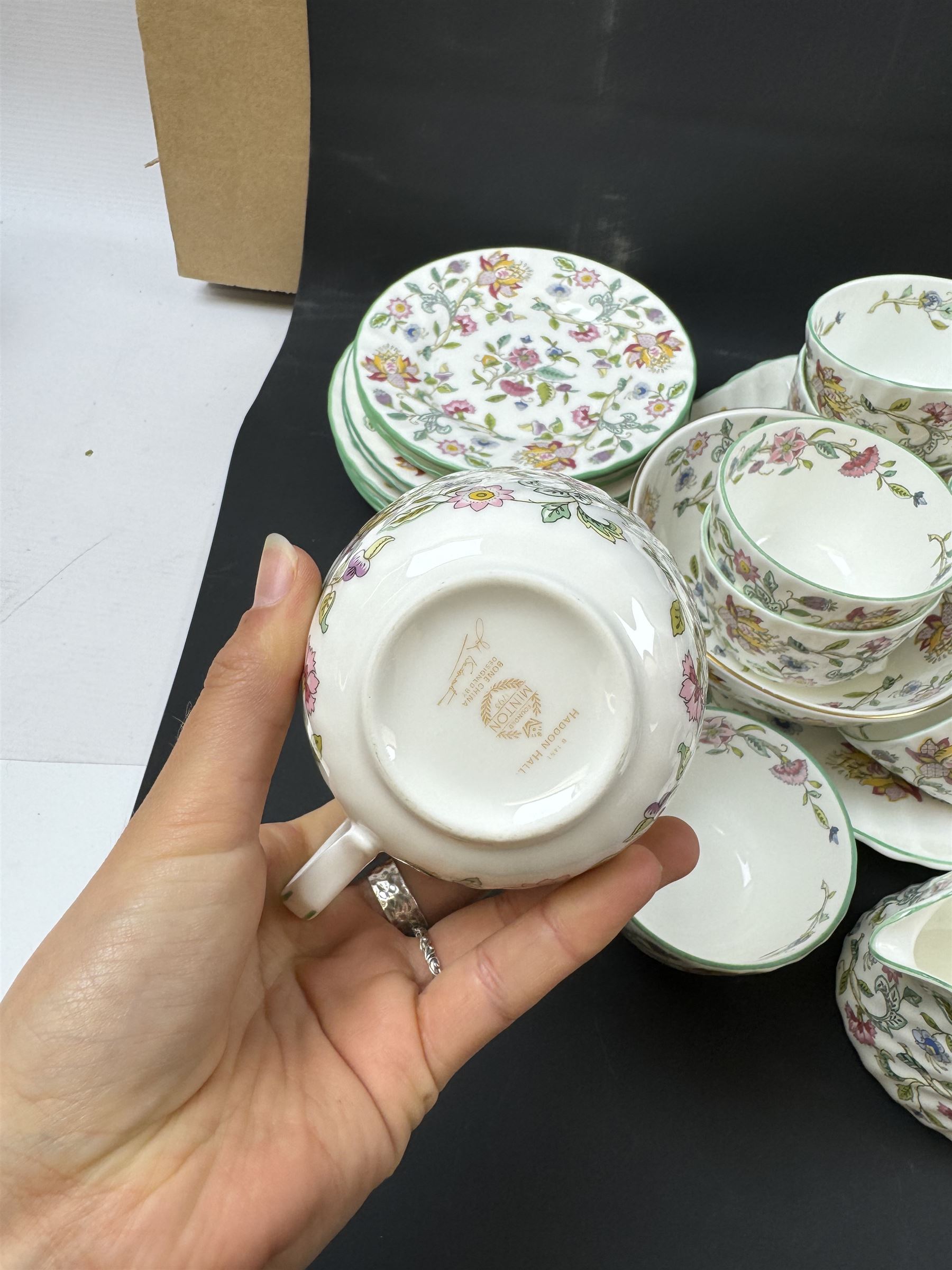 Minton Haddon Hall pattern part tea service, including milk jug, open sucrier, teacups and saucers, dessert plates etc