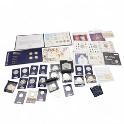 Mostly commemorative coinage, including The Royal Mint United Kingdom 2014 'Outbreak' fine silver twenty pound coin on card, various five pound coins with some on cards, commemorative fifty pence pieces, Queen Elizabeth II Tuvalu 2018 'Silver Thermometer' two dollars two ounce fine silver coin etc