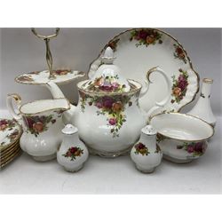 Royal Albert Old Country Roses pattern tea service for six, comprising teapot, sucrier, milk jug, dessert plates, one cake plate, one two tiered cake stand, salt and pepper pots and bud vase 