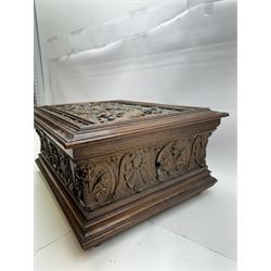 19th century Continental mahogany and oak box, carved in high relief with classical figures, harp, musical trophies, anthemion and foliate motifs, H22.5cm L48cm D38.5cm