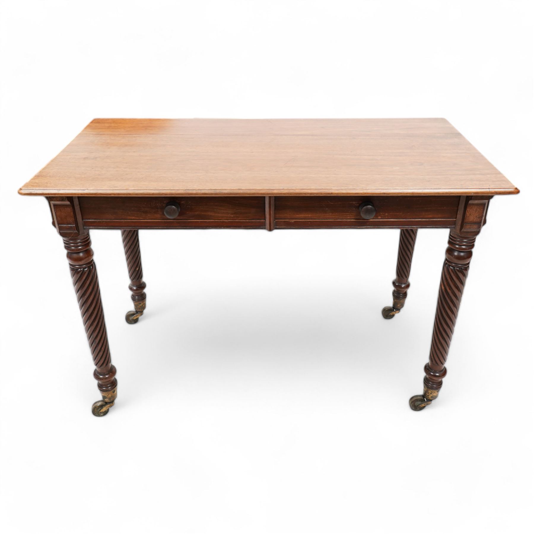 Victorian mahogany side table, moulded rectangular top over two drawers, on rope twist supports with brass cups and castors 