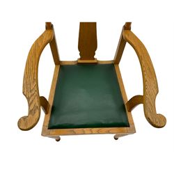Georgian style light oak desk chair, the shaped cresting rail over vase shaped splat, drop in seat, cabriole front supports joined by turned stretchers
