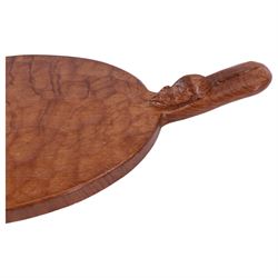 Mouseman - tooled oak cheeseboard, oval form with projecting handle carved with mouse signature, by the workshop of Robert Thompson