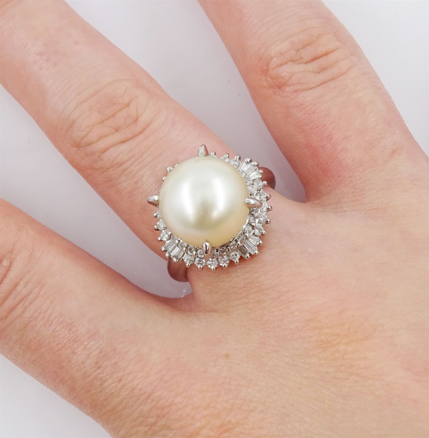 Platinum single stone cultured pearl and diamond cluster ring, stamped, total diamond weight approx 0.50 carat