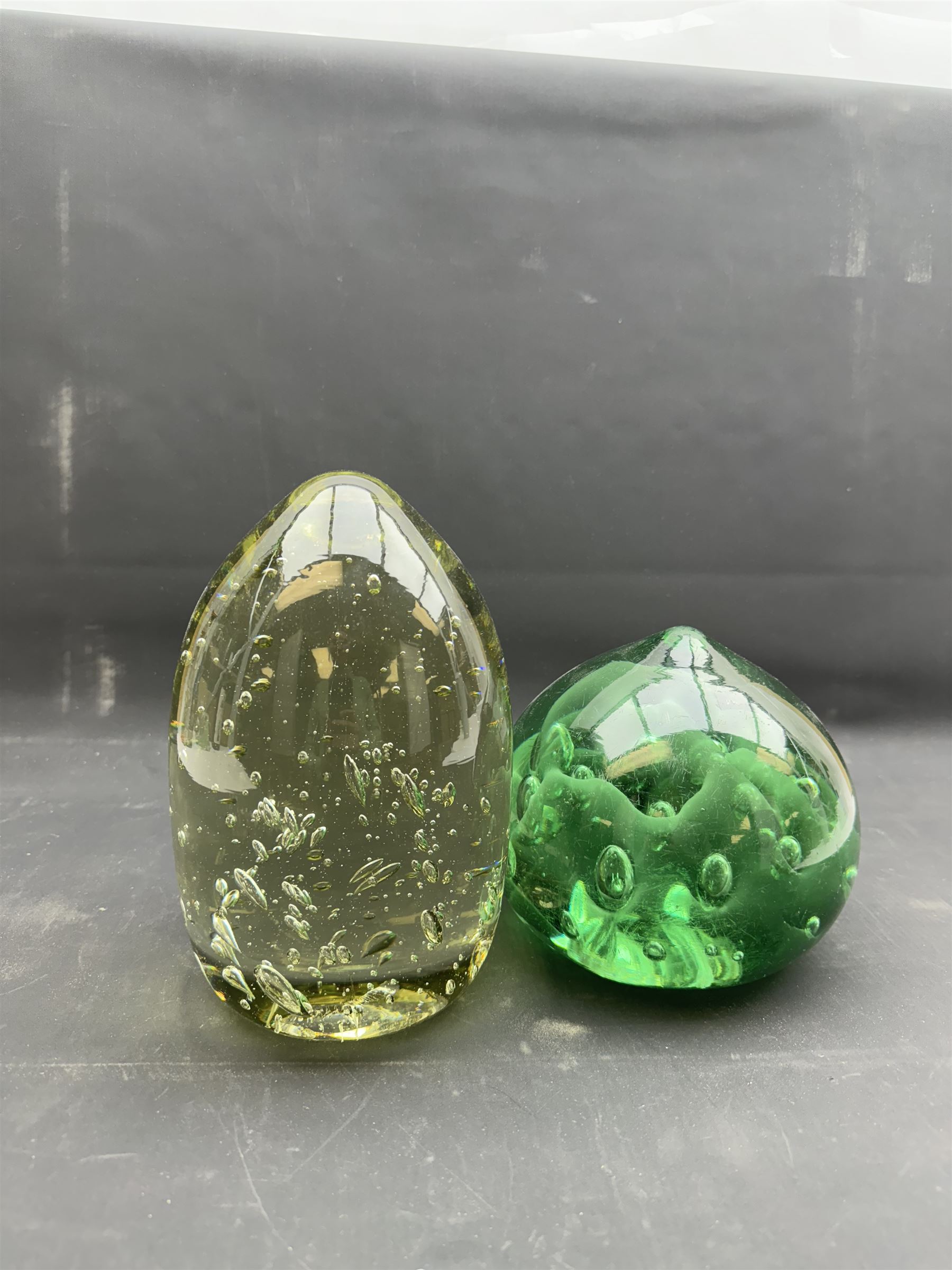 Two extra large Victorian glass dumps, with bubble inclusions tallest H22cm