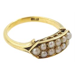 Early 20th century gold milgrain set two row split pearl ring, stamped 18ct