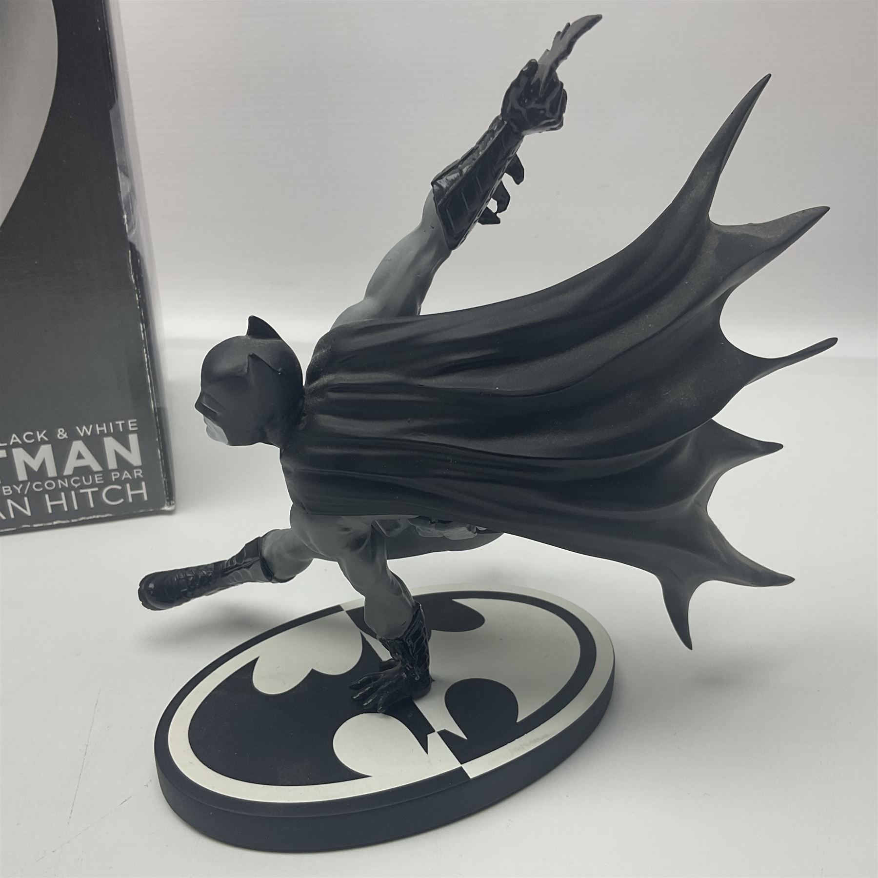 Group of five limited edition DC Direct Black and White Batman hand-painted cold-cast porcelain statues in original boxes, with two similar examples from DC Collectibles 