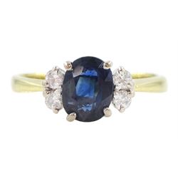 18ct gold oval cut sapphire and four stone round brilliant cut diamond ring, Birmingham 19...