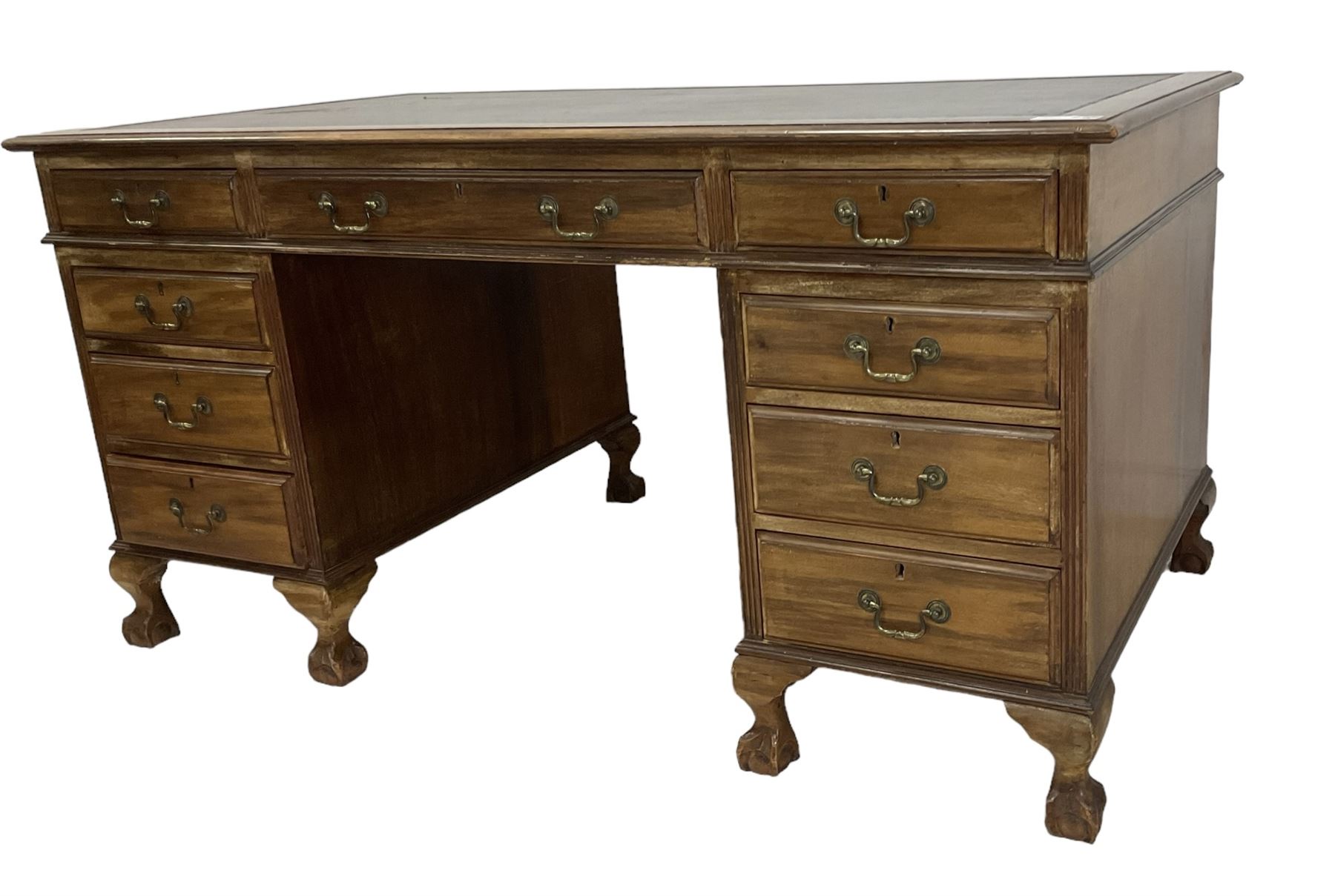 Georgian design twin pedestal desk, rectangular top with green leather inset, fitted with nine drawers, on cabriole supports with ball and claw feet 