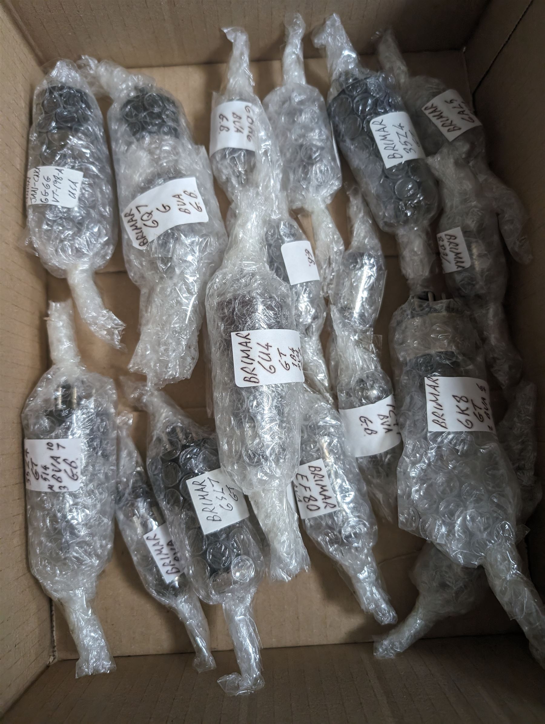 Large collection of thermionic valves/vacuum tubes by various makers, including Brimar, Marconi and Ferranti, some boxed and some bubble wrapped identified examples 