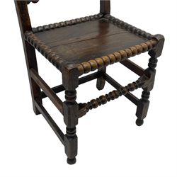 Set of three 18th century carved oak back stools, the cresting rail carved with scrolling foliate motifs over an arched panel with a stylised tree carving with extending leafage, the panelled seat held within a bobbin-turned frame, raised on turned supports united by a ring-turned front stretcher