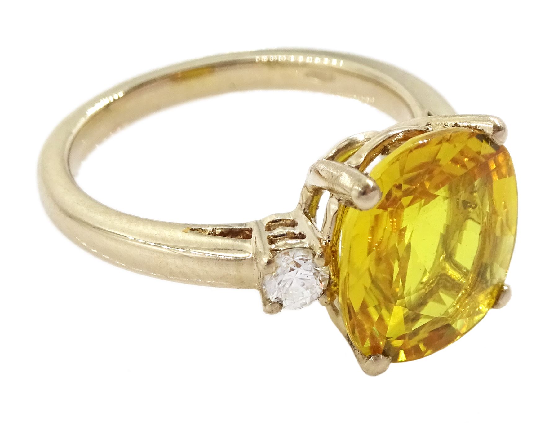 18ct gold three stone yellow sapphire and round brilliant cut diamond ring, hallmarked, yellow sapphire approx 5.20 carat