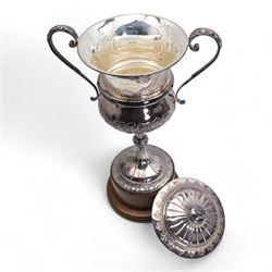 'The Racal Chesterfield Cup, Goodwood 30th July 1988' - Edwardian silver two handled cup and cover with scroll handles and leaf decoration on wooden base H52cm overall Birmingham 1908 Maker Jones & Crompton