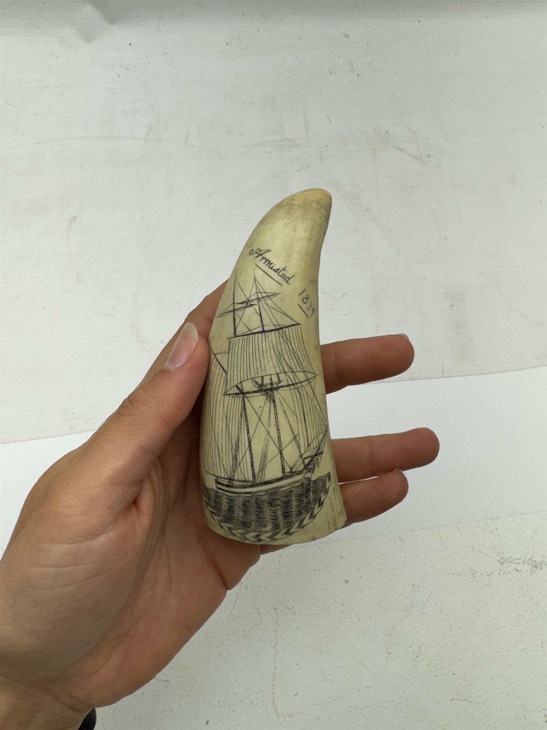 19th century scrimshaw whale tooth, the first inscribed Armistad 1839 depicting ship, L11cm 